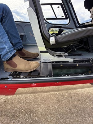 cockpit floor window passenger seated